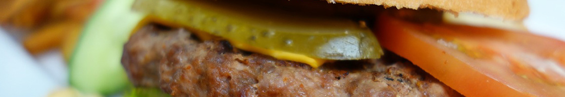 Eating Burger at Chip's Old Fashioned Hamburger restaurant in Dallas, TX.